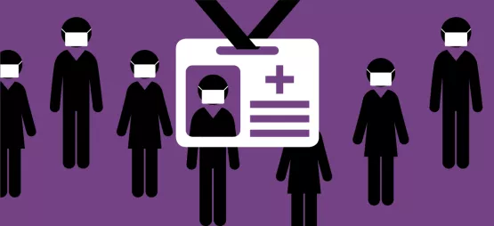 Image of NHS staff wearing PPE and an ID badge